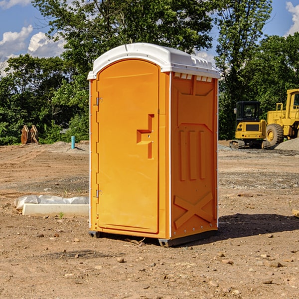 how often are the porta potties cleaned and serviced during a rental period in McQueeney